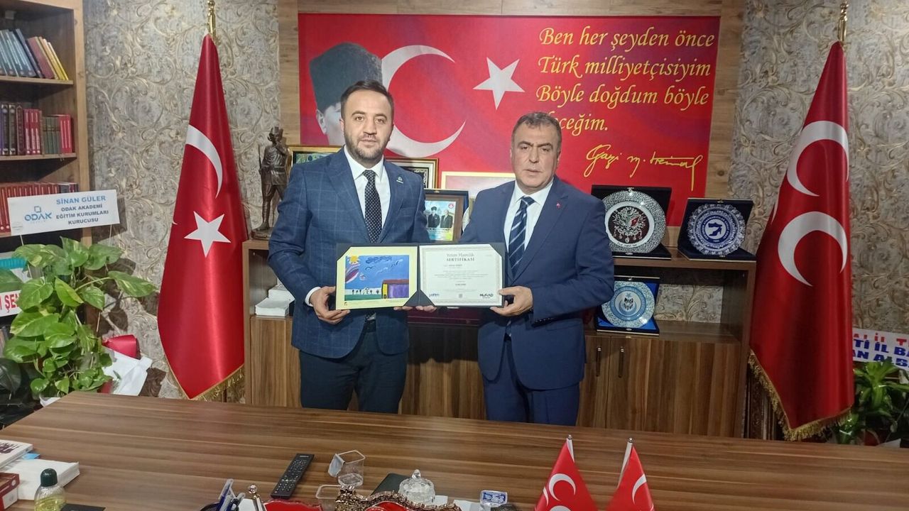 MÜSİAD Heyeti, MHP İl Başkanı Ayhan Sezer’i Ziyaret Etti